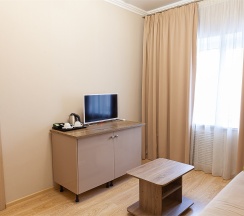 Двухкомнатный люкс с двумя раздельными кроватями в Рем Отель