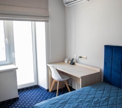 Номер улучшенный стандарт с 1 односпальной кроватью в Хабаровск