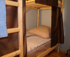 Кровать в общем номере в Рус