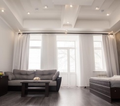 Люкс с балконом и кроватью размера «king-size» в Лофт