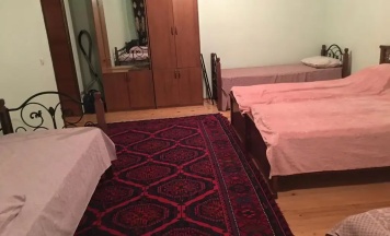 Кровать в общем номере (общая ванная комната) в Уют