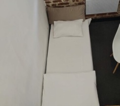 Трехместный номер Лофт с двуспальной и раскладным креслом/кроватью в Лофт отель на Крымской