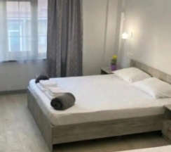 Четырёхместные апартаменты Deluxe с балконом и с красивым видом из окна в Гостевой дом Белый Лотос