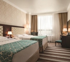Двухместный номер Делюкс с 2 кроватями размером 160*200 см каждая в Ramada by Wyndham Kazan City Centre