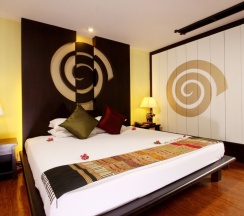 Двухместная вилла с видом на сад двуспальная кровать в Andaman Cannacia Resort & Spa