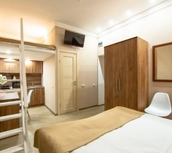 Четырёхместная семейная номер-студия Deluxe в Ботанический сад