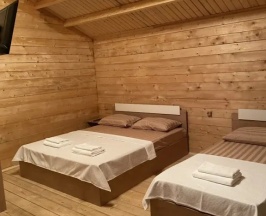 Трёхместный коттедж с балконом в Miussera Sea