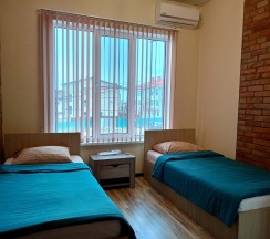 Апартаменты/Семейный четырехместный трехкомнатный номер с раздельными кроватями в Морской