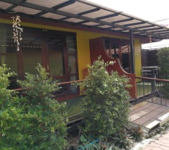Двухместное бунгало с видом на сад двуспальная кровать в Ricci House Resort