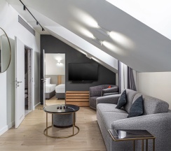 Двухместные апартаменты Deluxe Мансарда 2 отдельные кровати в The Basilian Minsk, Curio Collection by Hilton