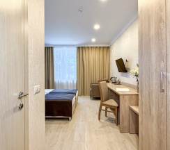 "Стандарт" Стандартный трехместный номер с 2 отдельными кроватями и дополнительным местом в Диона