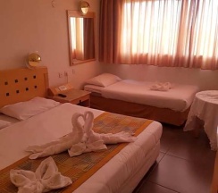 Четырёхместный номер Standard двуспальная кровать в Aquamarine Hotel