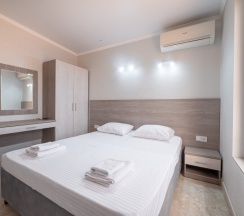 Апартаменты Люкс (с кухней и террасой с видом на море и горы) в Эллада