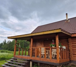 Дом с 2 комнатами с видом на озеро в Глэмпинг на озере Сиг