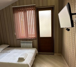 Номер студия семейный (мансарда) в Лиана