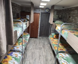 Кровать в общем номере (мужской номер) в Подсолнух
