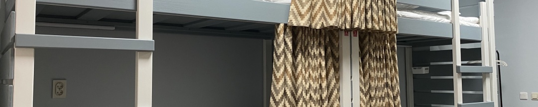 Кровать в мужском номере с 4 кроватями в Рус-Арена