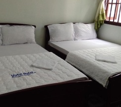 Четырёхместный номер Standard в Vuta Hotel