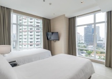 Трёхместные семейные апартаменты с видом на город в Posh Residence Thonglor by Favstay