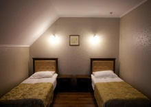 Номер стандарт комфорт с 2 односпальными кроватями (мансарда) в Гарден