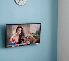 Большой номер с одной большой кроватью, диваном и кухней в Port inn