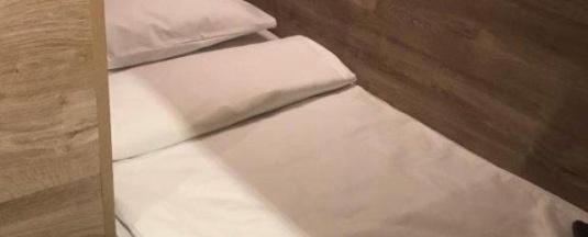Номер стандарт с 1 односпальной кроватью (без окна) в Shelterz