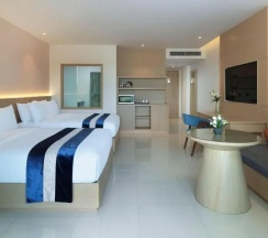 Двухместный номер Grand Deluxe с балконом двуспальная кровать в Chanalai Flora Resort, Kata Beach