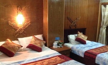 Двухместный номер Standard с видом на сад двуспальная кровать в Ruan Mai Naiyang Beach Resort