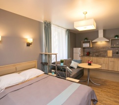 Студия Powder и Aquamarine с одним окном в New Horizon Ovechkin Apartments
