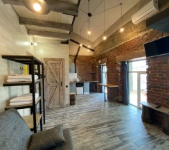 Семейные двухуровневые апартаменты с кухней в Loft Apart