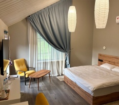 Двухуровневый Джуниор Сюит на втором этаже со своей зоной отдыха в Игуана