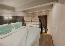 Двухуровневые апартаменты студия #1 в KvartHotel (КвартОтель) на Савушкина 6К