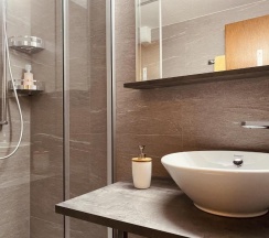 Четырёхместные апартаменты односпальная кровать в Hotel Capricorn