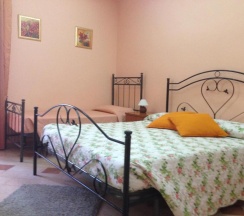 Четырёхместный номер Standard с балконом в B&B Resalibera