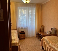 Улучшенный двухместный номер с двумя односпальными кроватями в Лотос