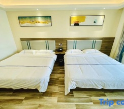 Двухместный номер Deluxe 2 отдельные кровати в Sheraton Hotel (Zhengzhou 270 Wanda Zhengshang Yujianmingzhu Branch)