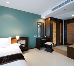 Двухместный номер Standard с видом на сад двуспальная кровать в Tara Mantra Cha Am Resort