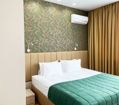 Номер стандарт улучшенный с 1 двуспальной кроватью в Хабаровск