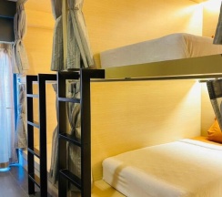 Кровать в общем номере в Rabbitel Phuket