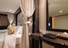 Четырёхместный семейный номер Standard в Bossotel Bangkok