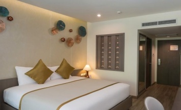 Двухместный номер Superior с видом на сад двуспальная кровать в Chanalai Flora Resort, Kata Beach