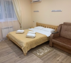 Стандарт с двуспальной кроватью и кресло-кроватью в Лотос
