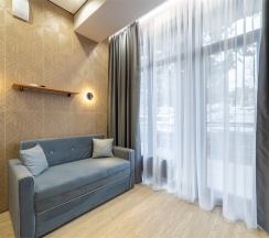 Апартамент с диваном в Булгаков by Sateen group