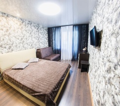 Трехкомнатные апартаменты  “Триумф” с парковкой в Огни Саратова Saratov Lights Apartments