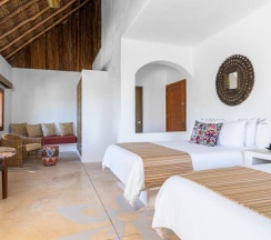 Номер Palapa с видом на океан в Shangri-la Caribe Beach Village Resort