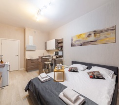 Улучшенная студия с кроватью king size и балконом в Pulkovo Apart