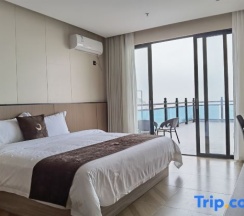 Двухместный номер Standard с видом на море двуспальная кровать в Taishan Golden Beach Resort