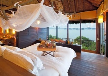 Номер Deluxe с видом на воду в Six Senses Yao Noi