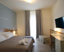 Трёхместный номер в Le Ginestre Family Wellness Hotel