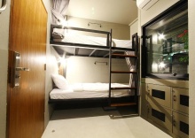 Кровать в общем номере в Here Hostel